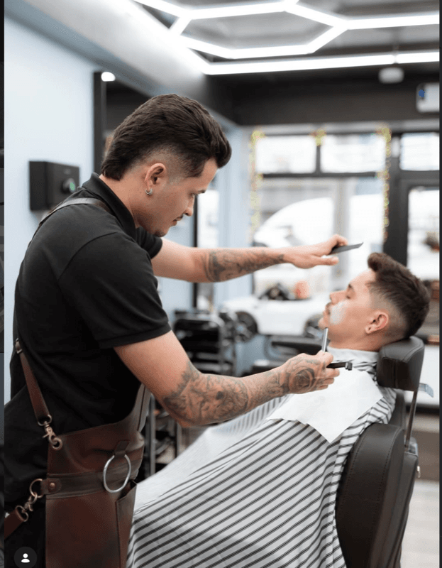 Barbers preparing stations — the team at work